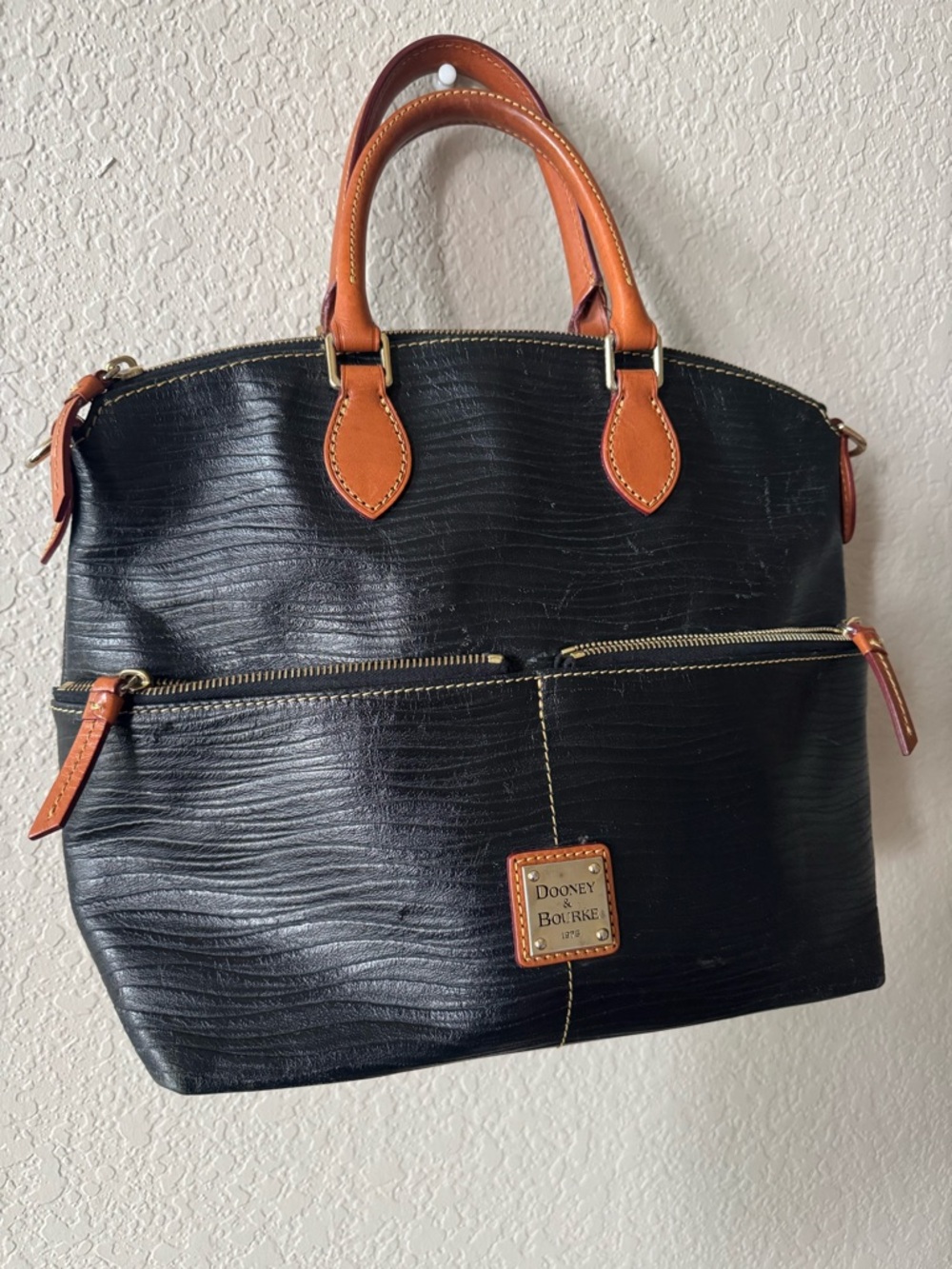 Authentic Dooney & Bourke black leather satchel with signature red interior